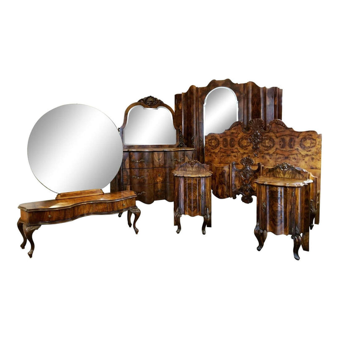 Italian Olive Wood Neo-Rococo Venetian Baroque Six Piece Bedroom Suite Scarce and stunning six-piece bedroom suite in the Italian Neo-Rococo / Venetian Baroque styles popular throughout Europe in the mid-to-late 19th century. This suite is made with Italian burled olive wood veneers, except for the dressing table constructed with burled walnut veneers. We attribute the manufacture of these furniture pieces to Fratelli Testolini; also known as the Testolini Brothers, Testolini Venise, and Testolini Freres Muebles; of Venice, Italy. Fratelli Testolini was founded by two Italian brothers and became the most highly regarded manufacturers for nearly a century of art furniture, wood carvings, mosaics, marbles, jewellery, Murano art glass, and table glass. After the deaths of the founders, two cousins inherited the business. One did not care for the business and created a merger for distribution of goods with Antonio Salviati, maker of glass, mosaics, and carved art furniture, and Jesurum. From 1902 through 1906 the business was held by The Venice Art Company of Venice and London and was known as Salviati, Jesurum & Co and as Salviati & Testolini as well as Testolini & Salviati. After the dissolution of the merger, Marco Testolini attempted to recover the business and maintained one carpentry workshop focused on casting furniture for other companies. Marco could never regain the previous success of the business and gave in to the sale of the workshop. Between 1847 and the 1902 merger, the Testolini Brothers were extremely successful with their original designs of