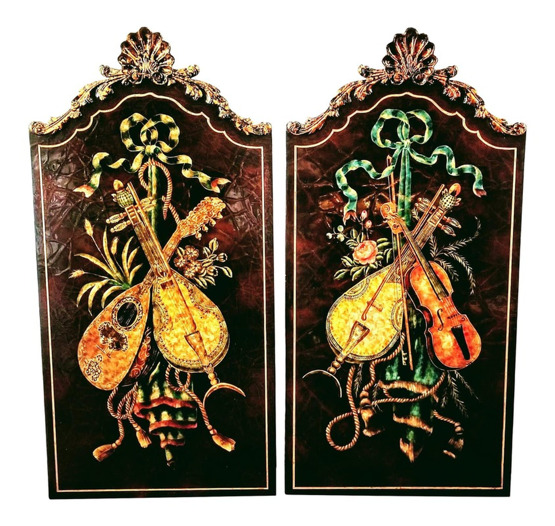 Pair of Maitland-Smith wall panels are in the Ottoman Baroque, or Rococo style which was brought to Istanbul from Europe by Sultan Ahmed III at the beginning of the 18th century.  The fronts feature textured hand painted themes of green ribbons; pink roses and buds; flowers and foliage; gold cords and tassels; folded Turkey work fabrics; and representational instruments of Turkish and European classical music - tambur, violin, and spike fiddles.  The bonnet top is crowned with burnished gold Rocaille decoration including a clamshell and acanthus leaves.  Panels are wired and ready for hanging on your walls.  Measurements : 30